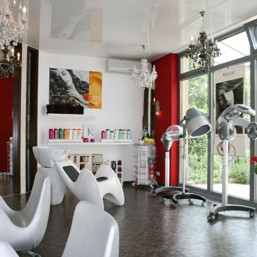 Wash stations and Kérastase care products in the salon